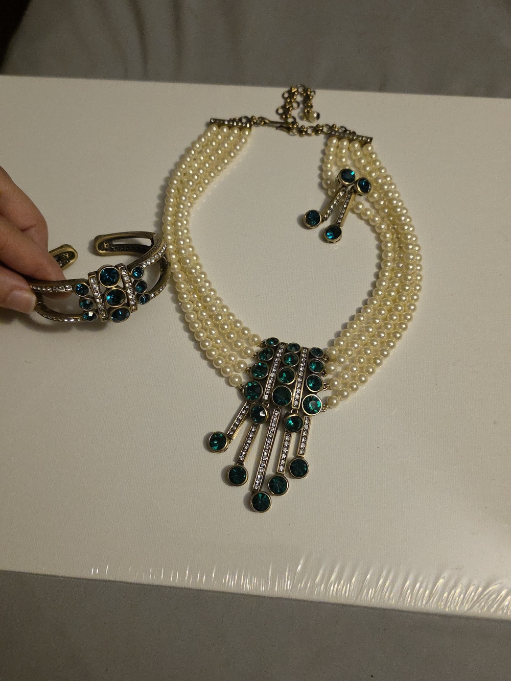The Heidi Daus Signed Jewelry Set includes a necklace, bracelet, earrings